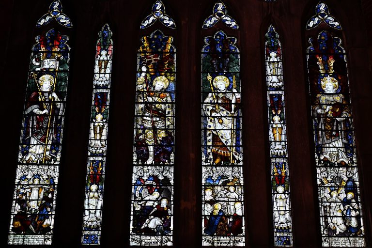 The Guardian Angels stained glass west window in St Michael and All Angels Church, Lyndhurst