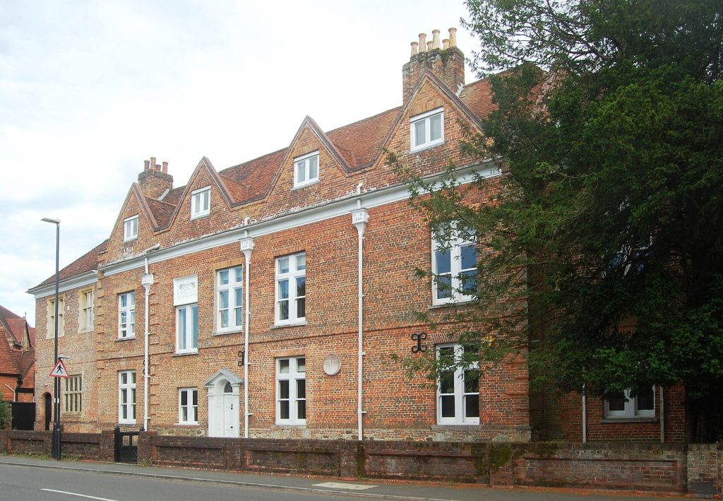 The brick front of the Queen's House on Lyndhurst High Street